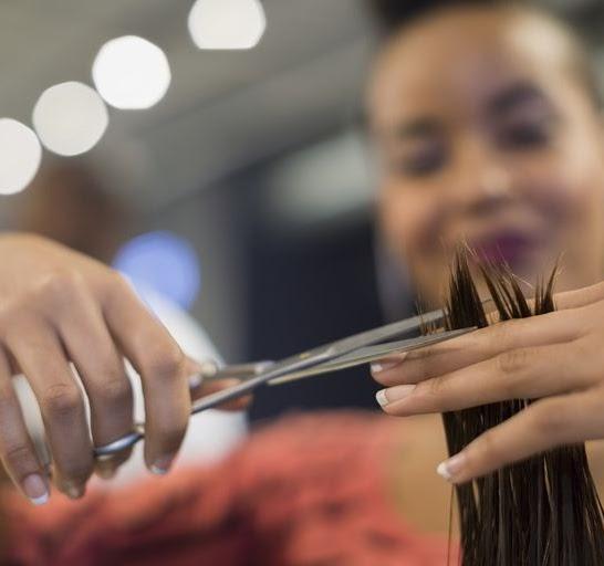 BCSS Student Monica cutting hair
