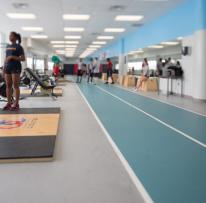 gym equipment with long green path on the floor