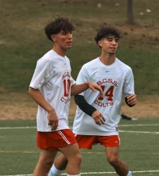 two soccer players on the field