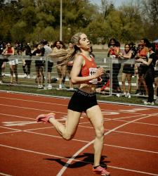 student running track