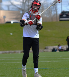 lacrosse player on field