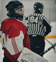 goalie with official in the background