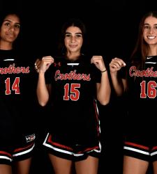 students wearing basketball uniforms