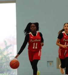 students playing basketball