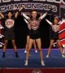 students performing on cheer stage