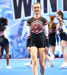 student on cheer stage