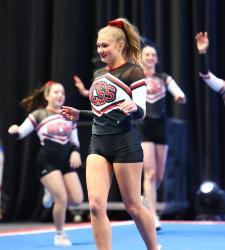 student on cheer stage