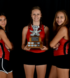 five students with trophy