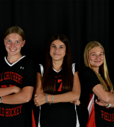 three members of the field hockey team