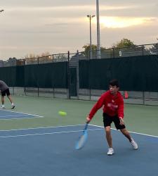 students playing tennis