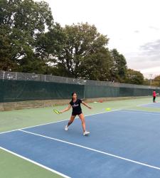 students playing tennis