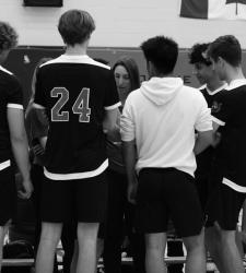 volleyball team huddle black and white