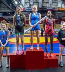 wrestling students on podium
