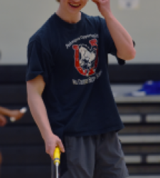 Student playing badminton